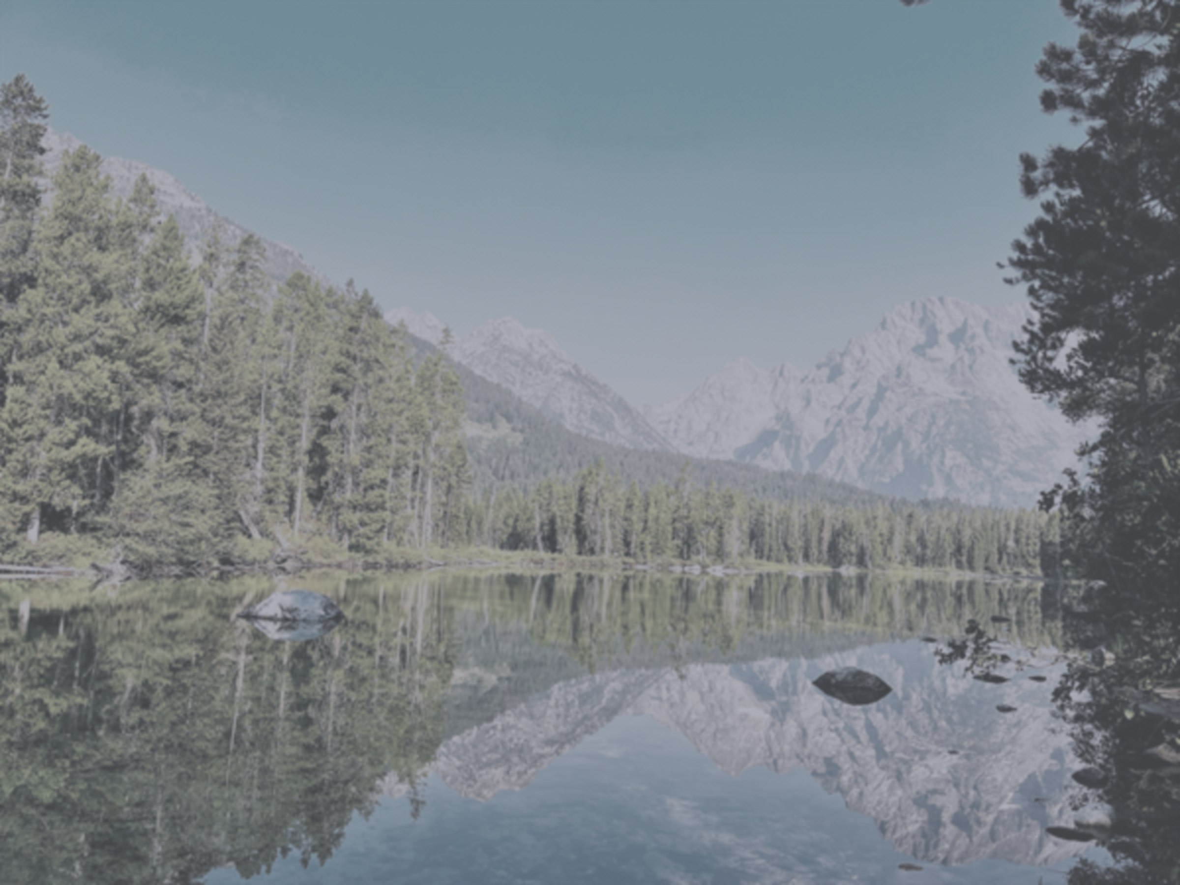 Before: the same lake reflection, flat and hazy.