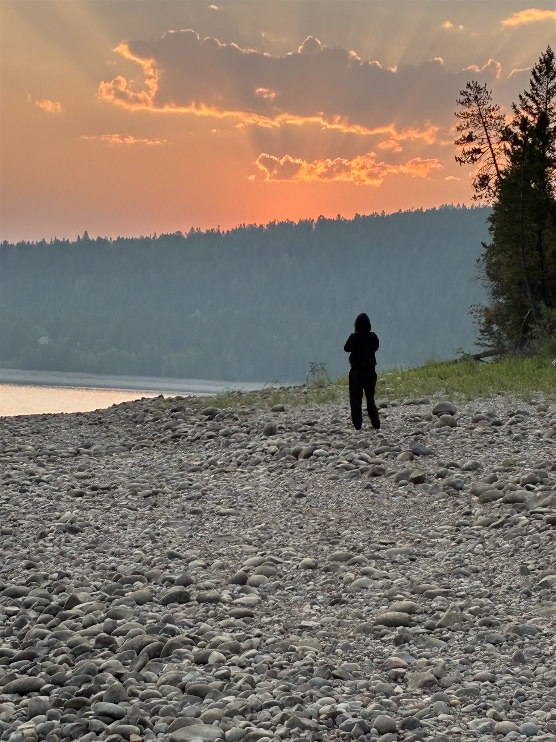 A sunset over open water.